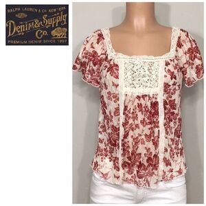 New. Floral semi sheer top. NWOT